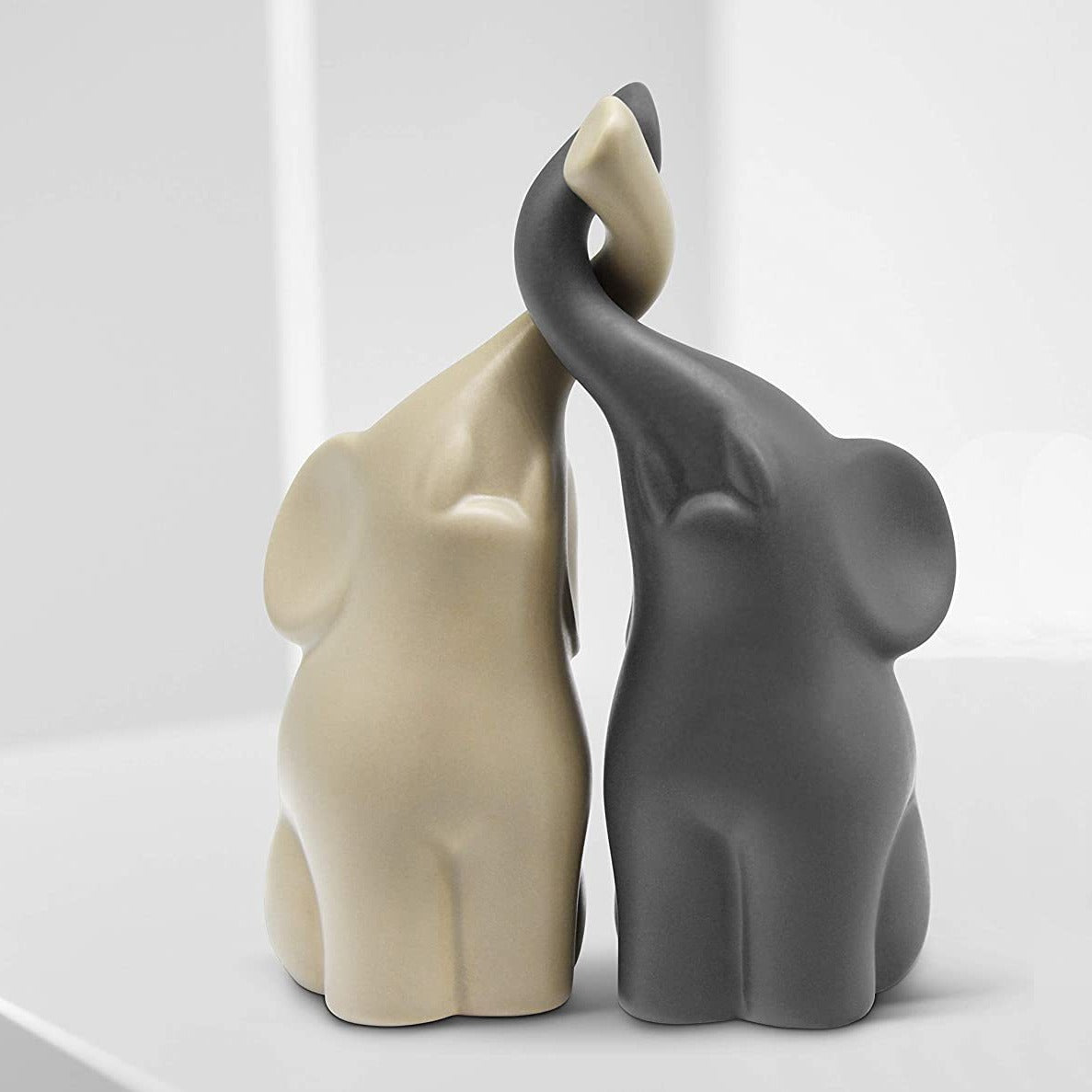 White and Gray Ceramic Elephant Figurine