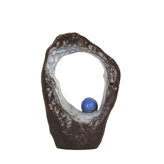 Blue-black stone arch sculptures with blue spheres